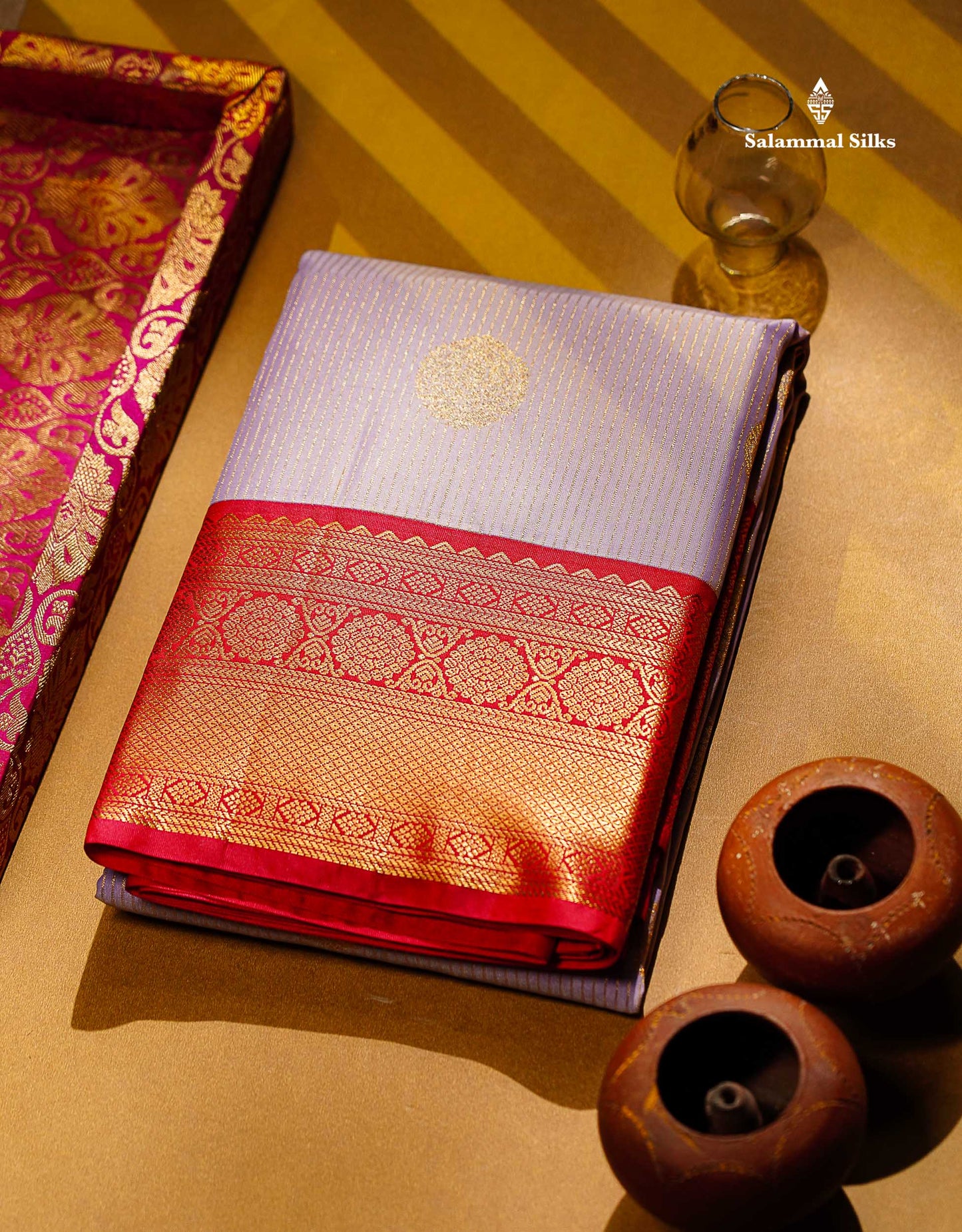 Semi Silk Saree - Light Lavender Butta With Lines Along With Contrast Chilly Red Traditional Border