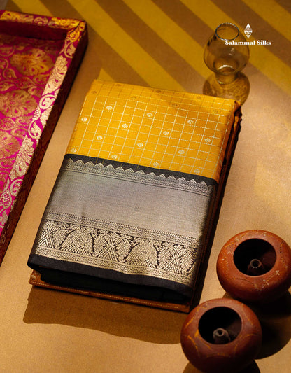 Semi Silk Saree - Mustard Yellow Butta With Small Checks Along With Contrast Snuff Brown Traditional Border