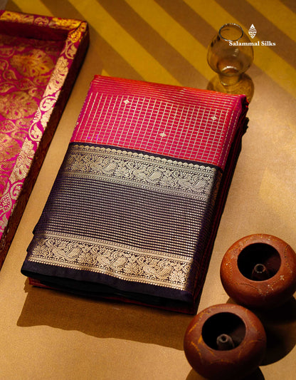 Semi Silk Saree - Dual Tone Pink Butta With Small Checks Along With Contrast Dark Purple Traditional Border
