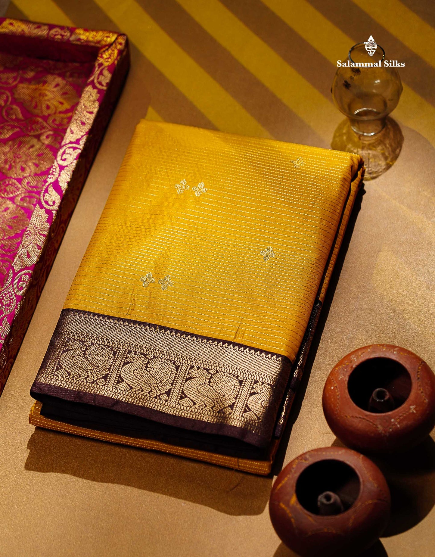 Semi Silk Saree -  Mustard Yellow Butta With Vaira Oosi Lines Along With Contrast Dark Brown Small Traditional Border