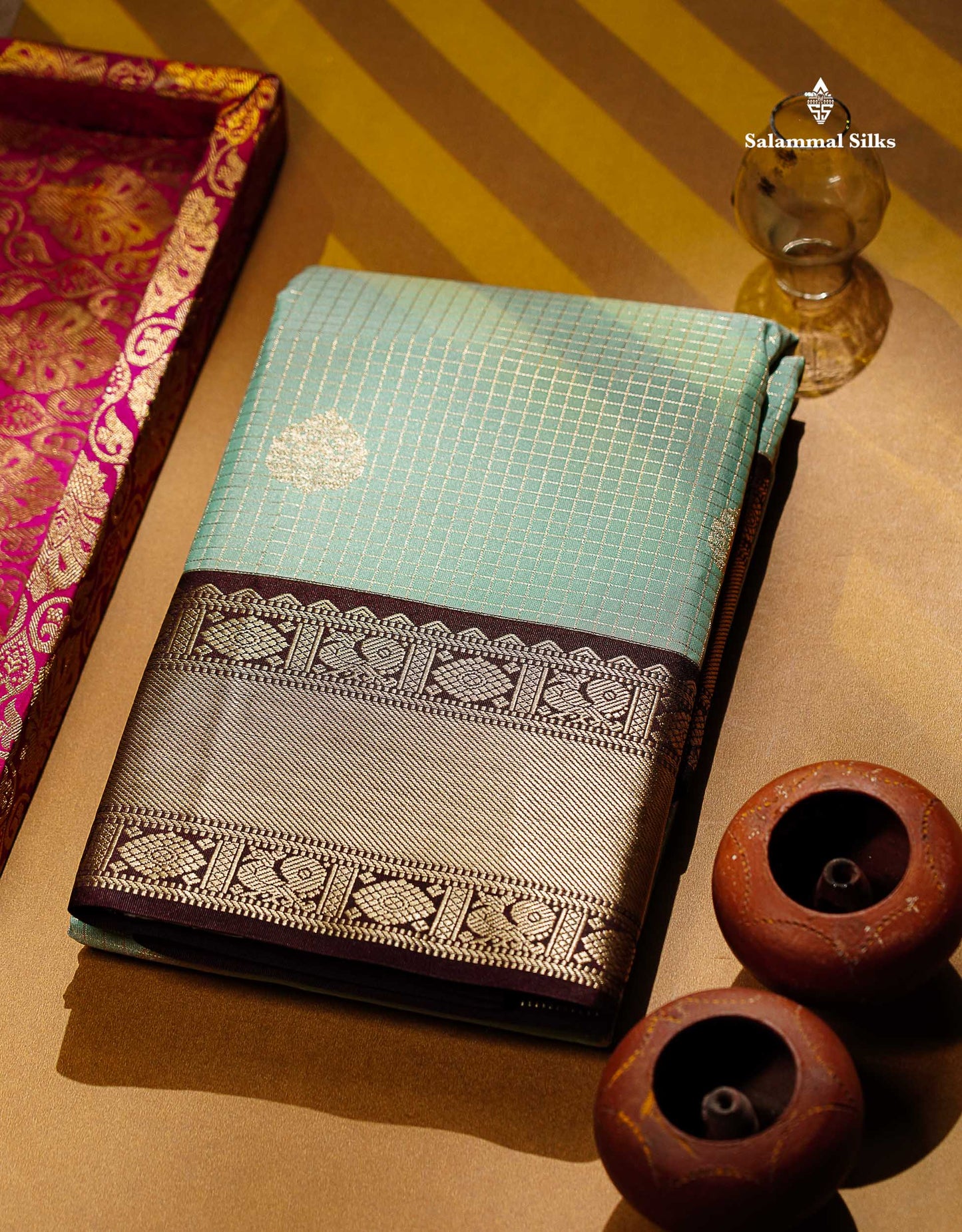 Semi Silk Saree -  Ice Blue Butta With Small Checks Along With Contrast Dark Brown Traditional Border