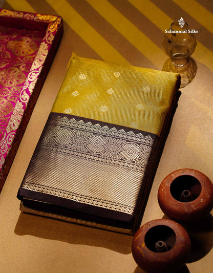 Semi Silk Saree - Olive Mustard Yellow Butta With Vaira Oosi Lines Along With Contrast Dark Brown Border