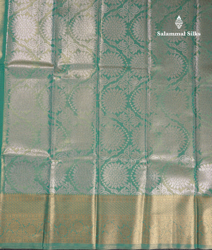 Beautiful Sapphire Green Tissue Semi Silk Saree With Traditional Evening Morning Border