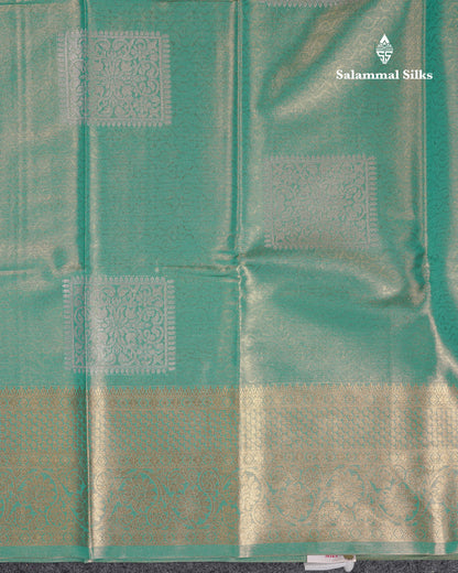 Beautiful Sapphire Green Tissue Semi Silk Saree With Traditional Evening Morning Border