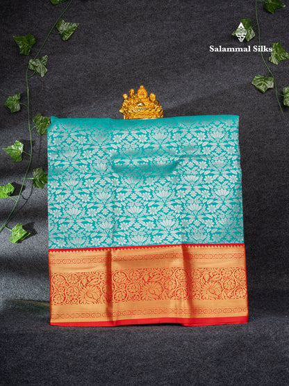 Semi Silk Pattu Pavadai (Sapphire Green) with Chilly Red Blouse 26.50"