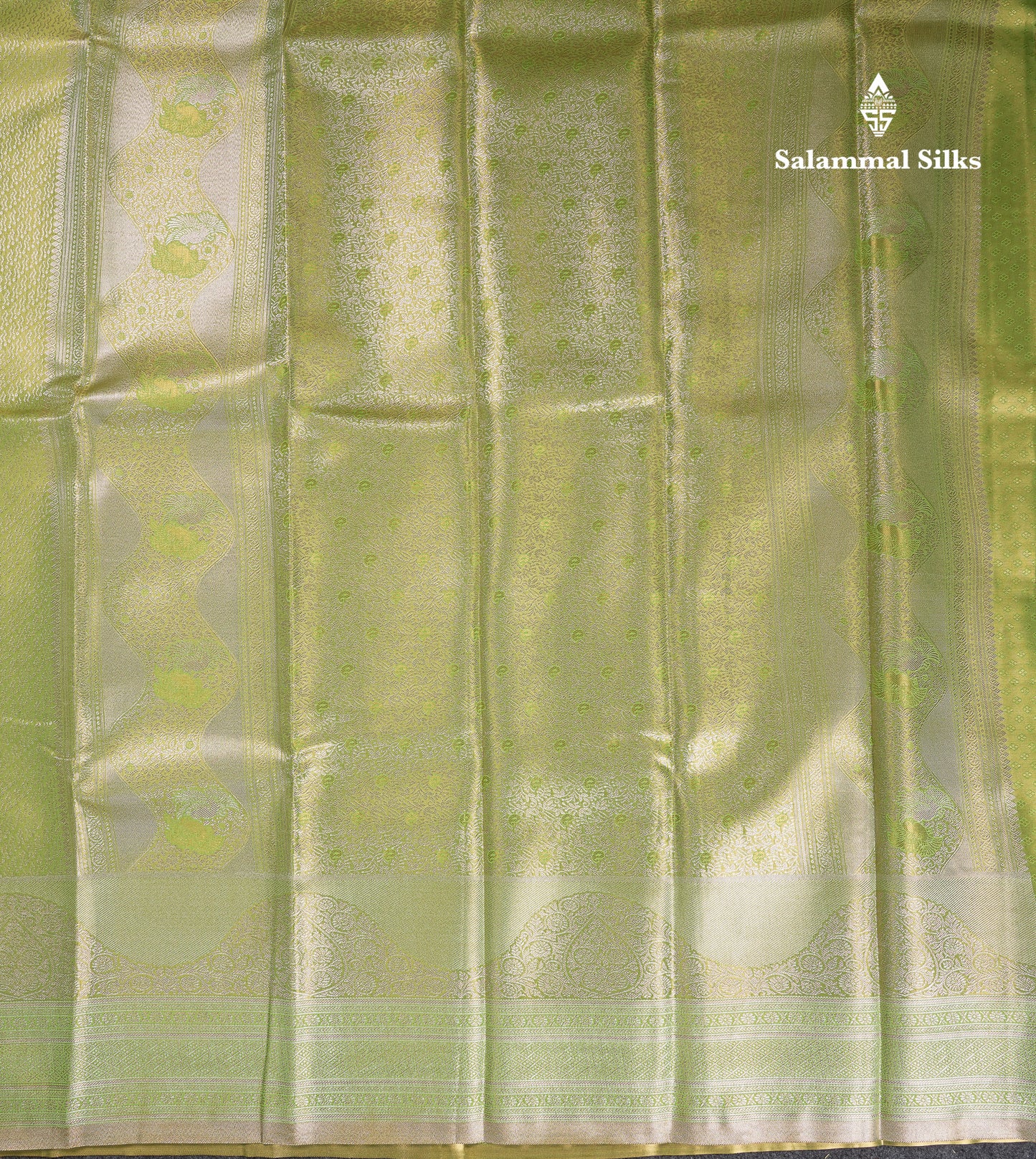 Beautiful Parrot Green Tissue Semi Silk Saree With Fancy Evening Morning Border