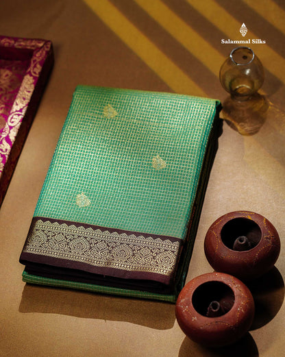Sapphire Green Tiny Vaira Oosi Checks With Leaf Buttas Semi Silk Saree With Contrast Dark Brown Traditional Small Border