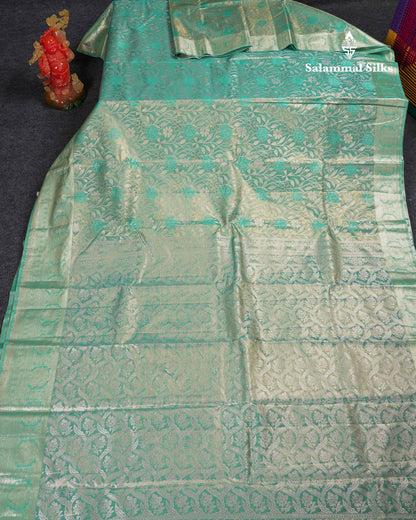 Beautiful Sapphire Green Tissue Semi Silk Saree With Traditional Evening Morning Border