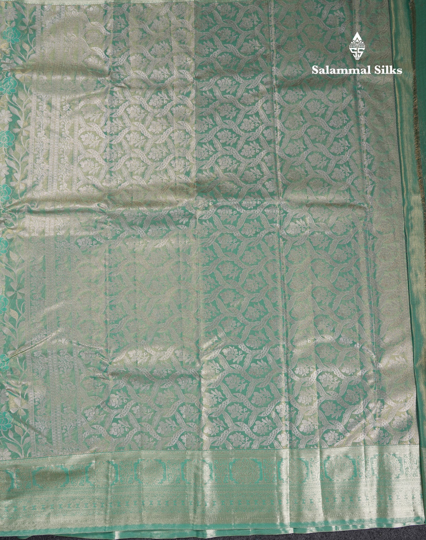 Beautiful Sapphire Green Tissue Semi Silk Saree With Traditional Evening Morning Border