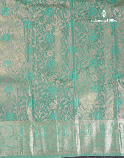 Beautiful Sapphire Green Tissue Semi Silk Saree With Traditional Evening Morning Border