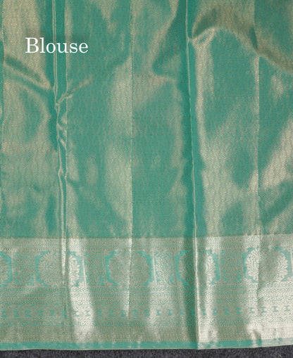 Beautiful Sapphire Green Tissue Semi Silk Saree With Traditional Evening Morning Border