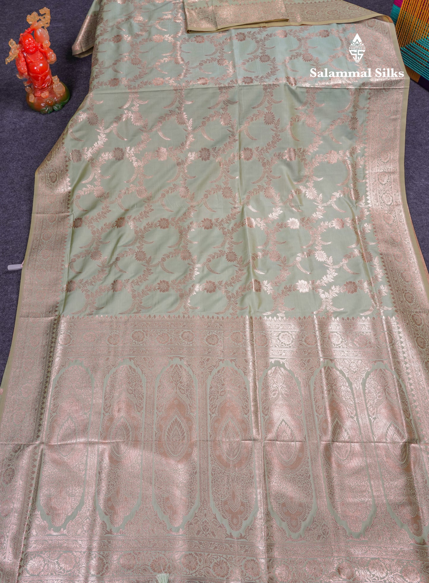 Beautiful Peacock Green Semi Banaras Saree With Fancy Border