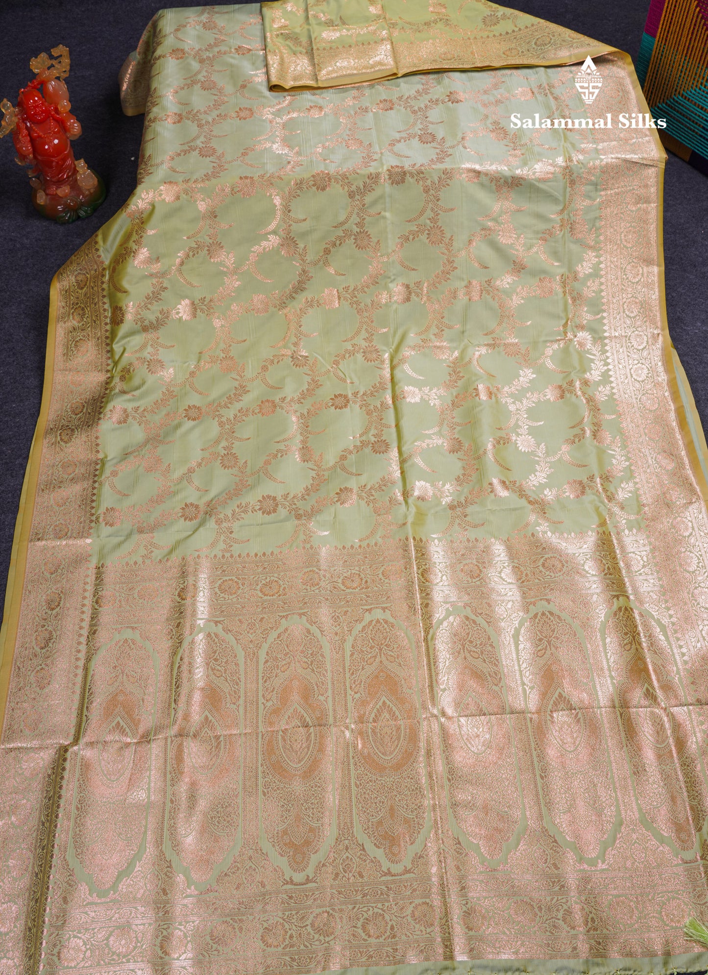 Beautiful Peacock Green Semi Banaras Saree With Fancy Border
