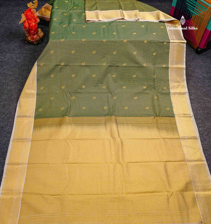Semi Silk Saree - Bottle Green Mango Butta With Tiny Vaira Oosi Checks Along With Contrast Cream Sandal Traditional Border