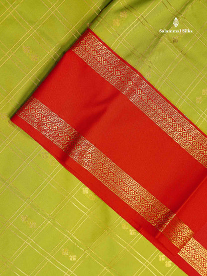 Semi Silk Saree - Parrot Green Butta With Checks Along With Contrast Red Traditional Gap Border