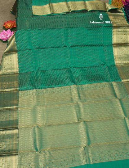 Peacock Green Pure Kanjivaram Silk Saree With Traditional Gold Zari Border