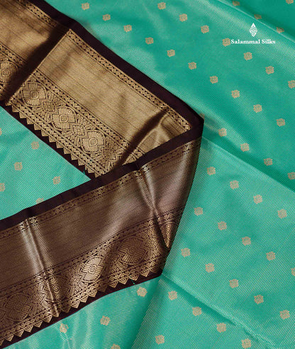 Semi Silk Saree - Mustard Yellow Butta With Vaira Oosi Lines Along With Contrast Dark Brown Traditional Border