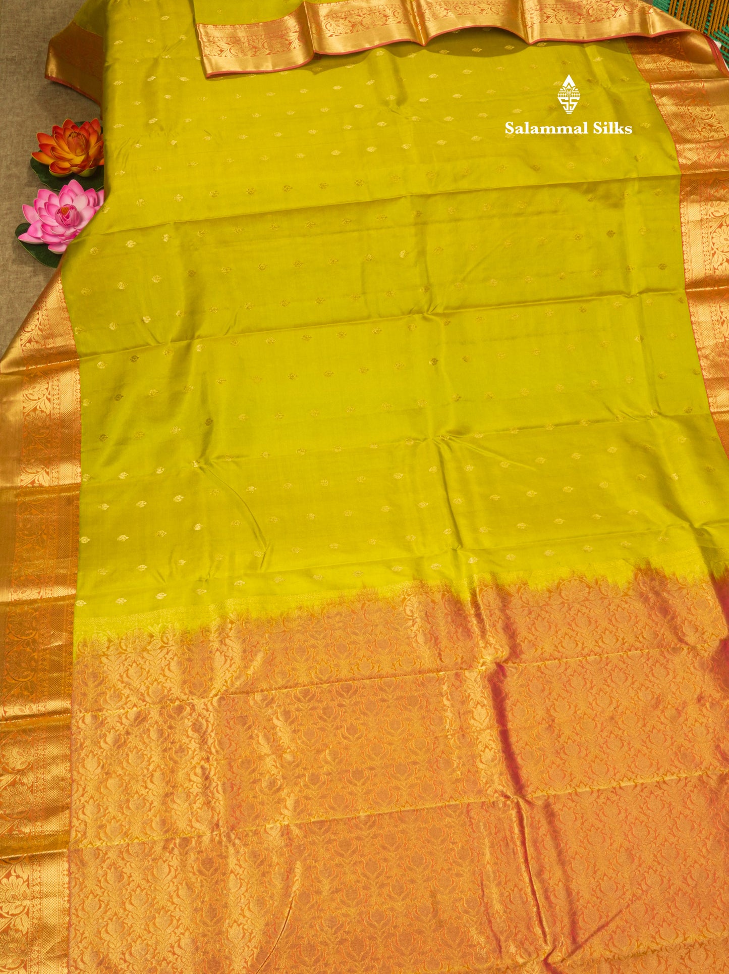 Manthulir Green Pure Kanjivaram Silk Saree With Contrast Peach Orange Border