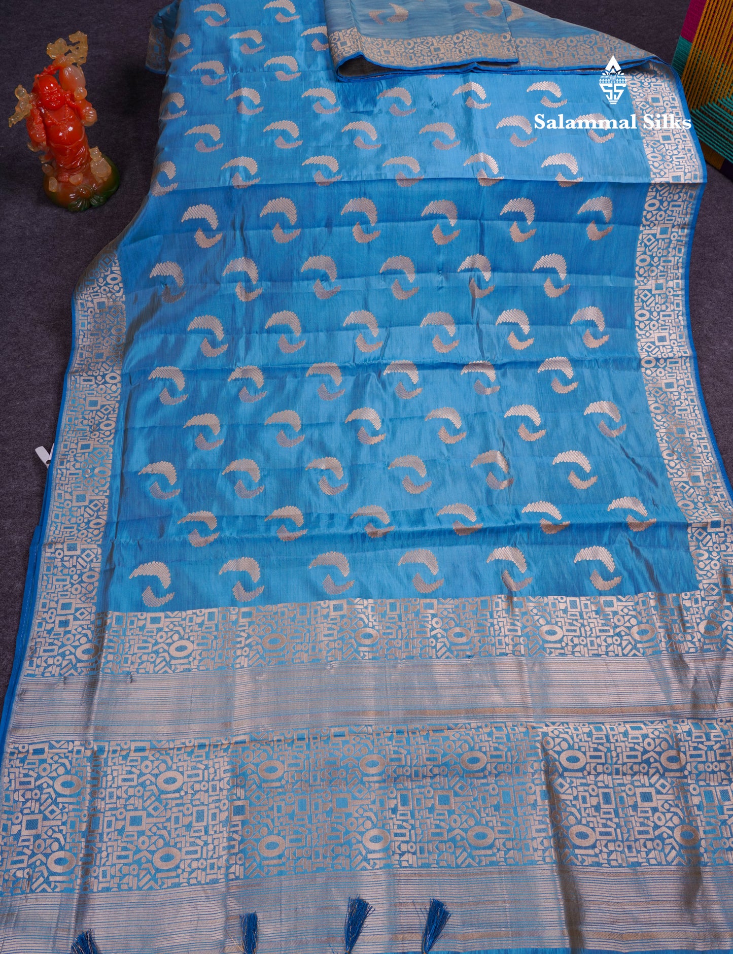Beautiful Blue Semi Raw Silk Saree With Fancy Border