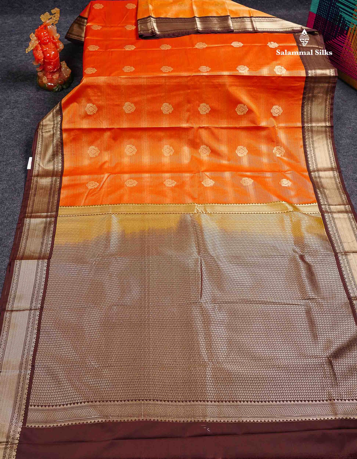 Semi Silk Saree - Orange Butta With Alai Vaira Oosi Lines Along With Contrast Dark Brown Traditional Border