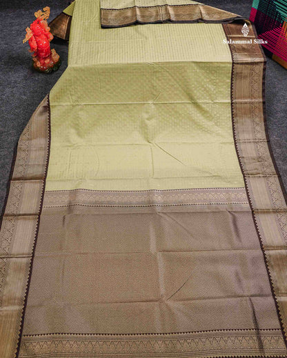 Semi Silk Saree - Light Pista Green Butta With Small Checks Along With Contrast Snuff Brown Traditional Border