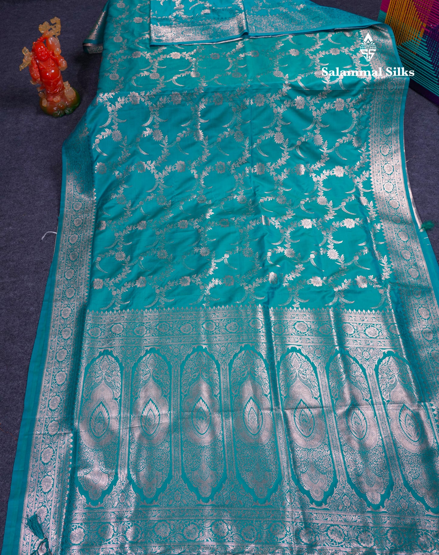 Beautiful Peacock Green Semi Banaras Saree With Fancy Border