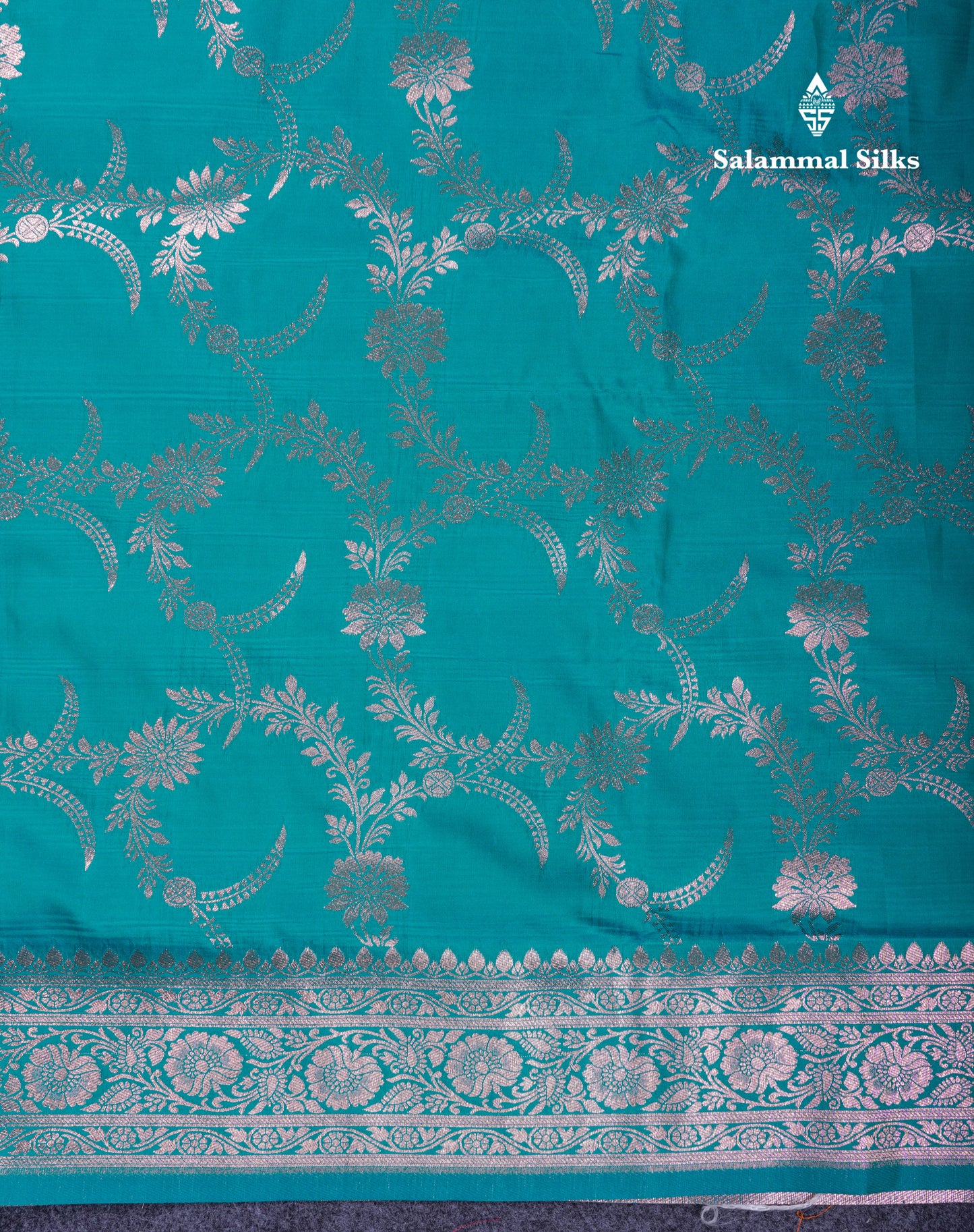 Beautiful Peacock Green Semi Banaras Saree With Fancy Border