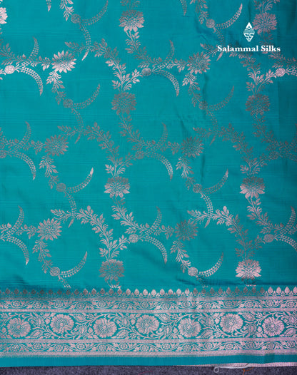 Beautiful Peacock Green Semi Banaras Saree With Fancy Border