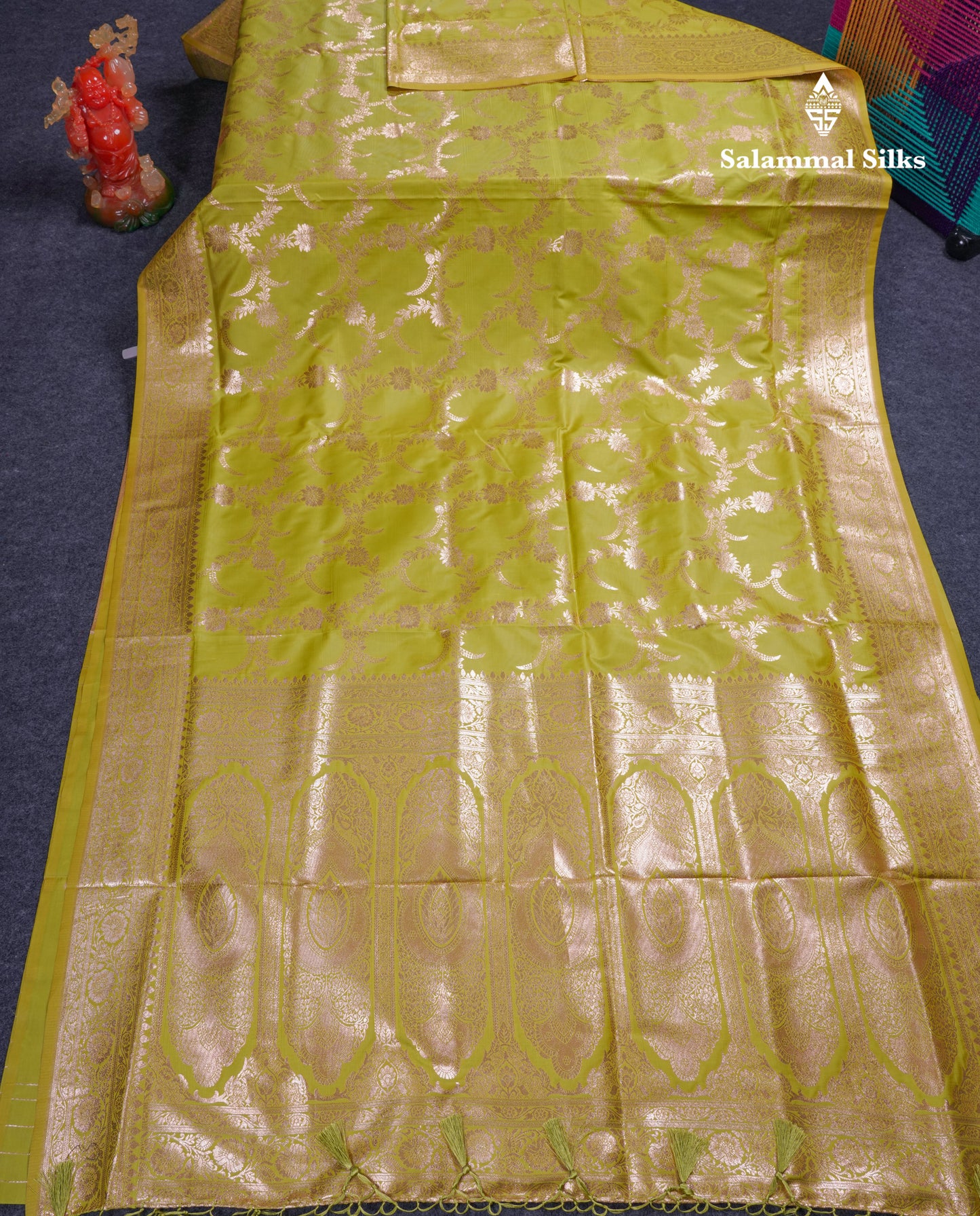 Beautiful Peacock Green Semi Banaras Saree With Fancy Border