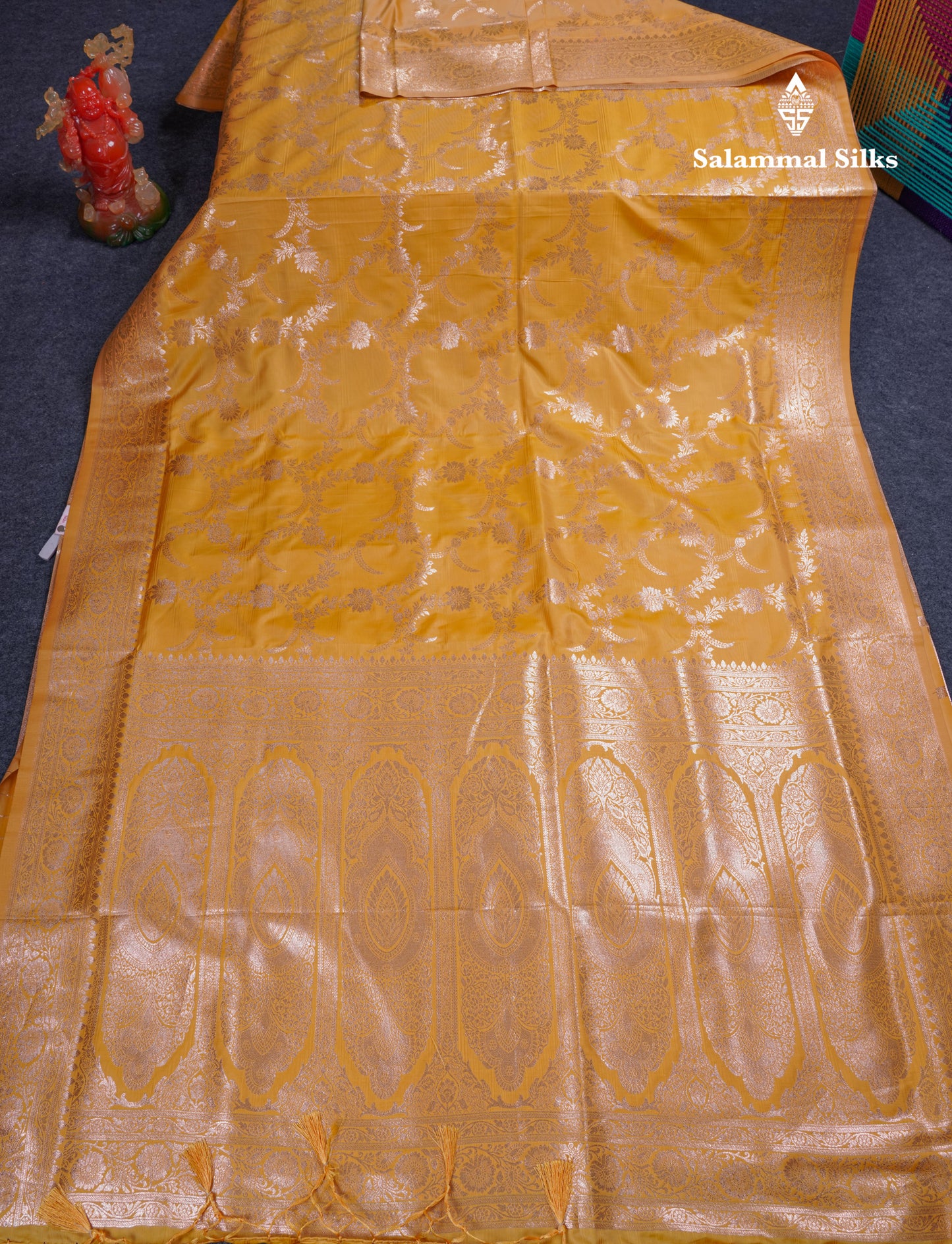 Beautiful Peacock Green Semi Banaras Saree With Fancy Border