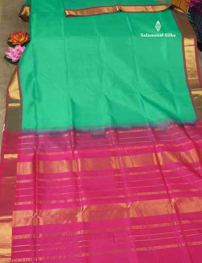 Saffire Green Plain Pure Silk Cotton Saree With Gold Zari Border