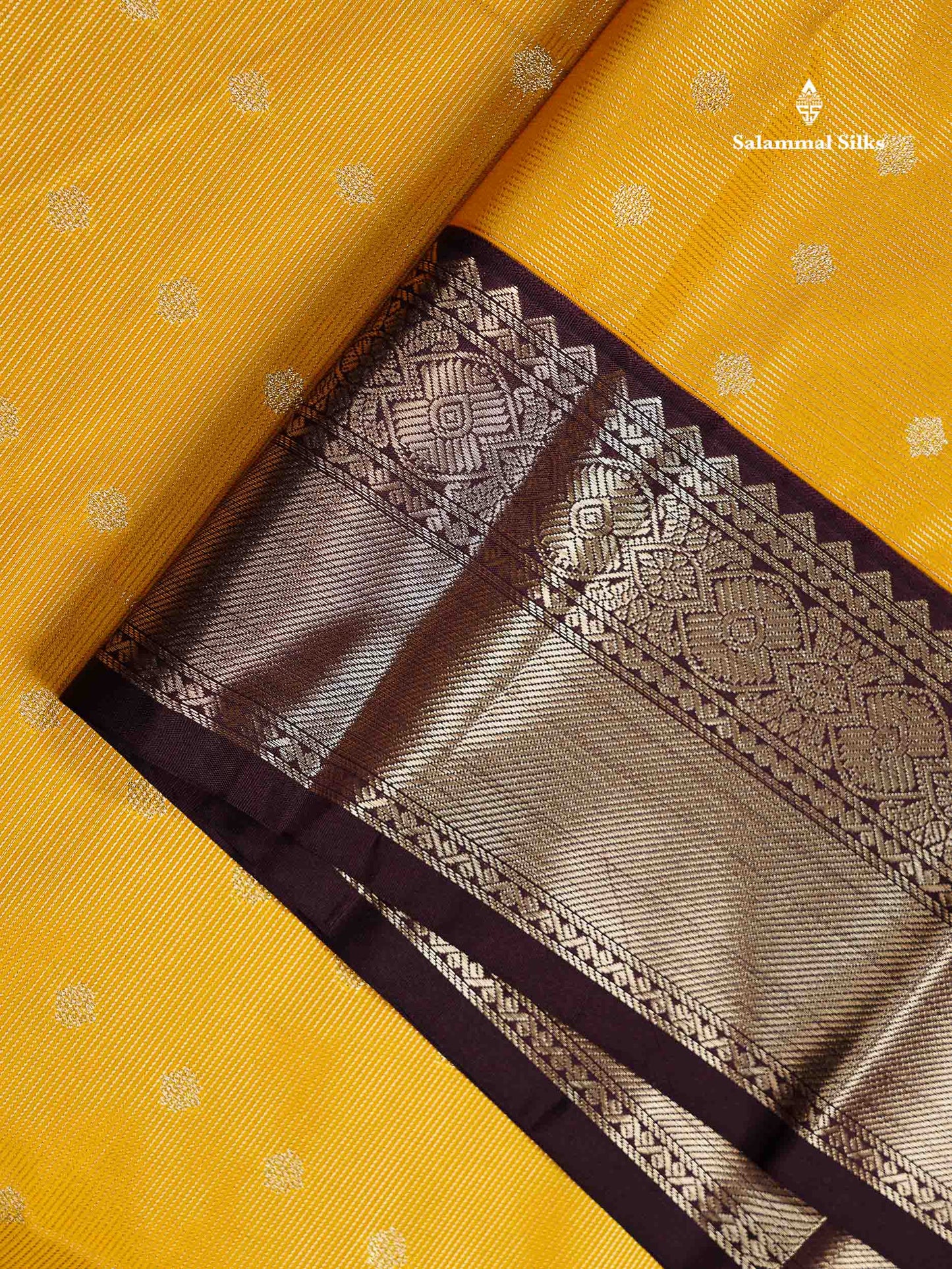 Semi Silk Saree - Mustard Yellow Butta With Vaira Oosi Lines Along With Contrast Dark Brown Traditional Border