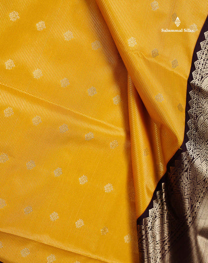 Semi Silk Saree - Mustard Yellow Butta With Vaira Oosi Lines Along With Contrast Dark Brown Traditional Border