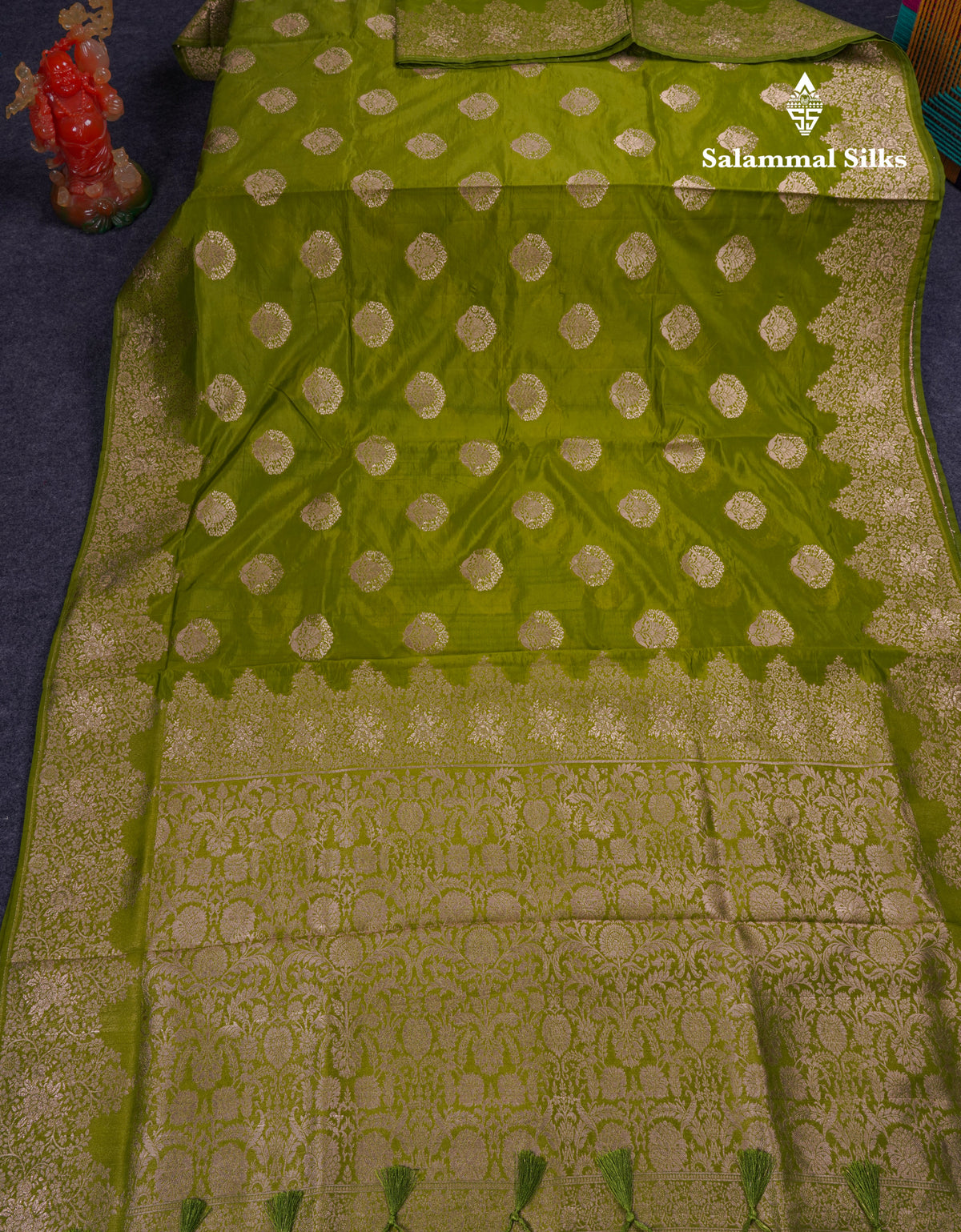 Beautiful Green Semi Raw Silk Saree With Fancy Border