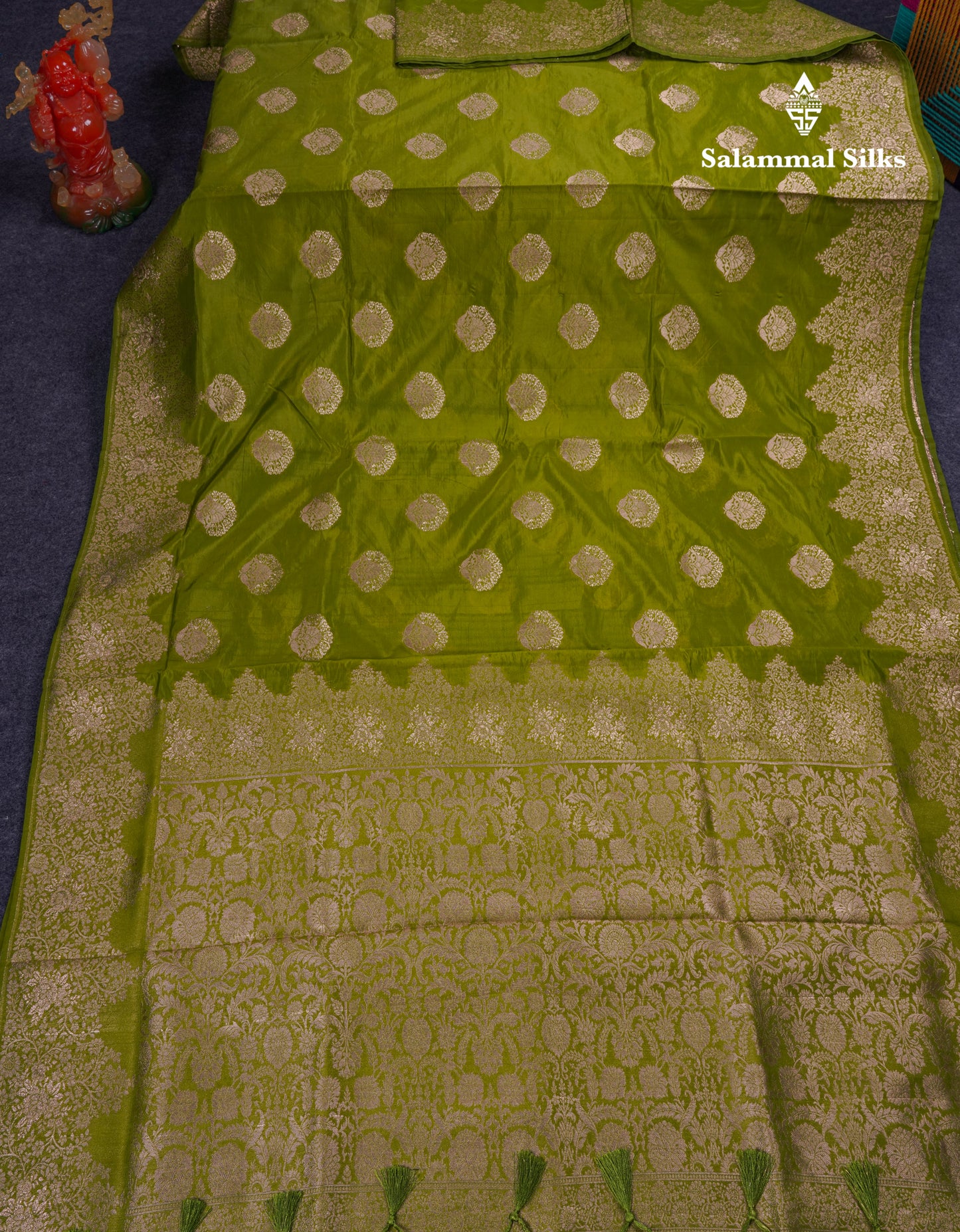 Beautiful Green Semi Raw Silk Saree With Fancy Border