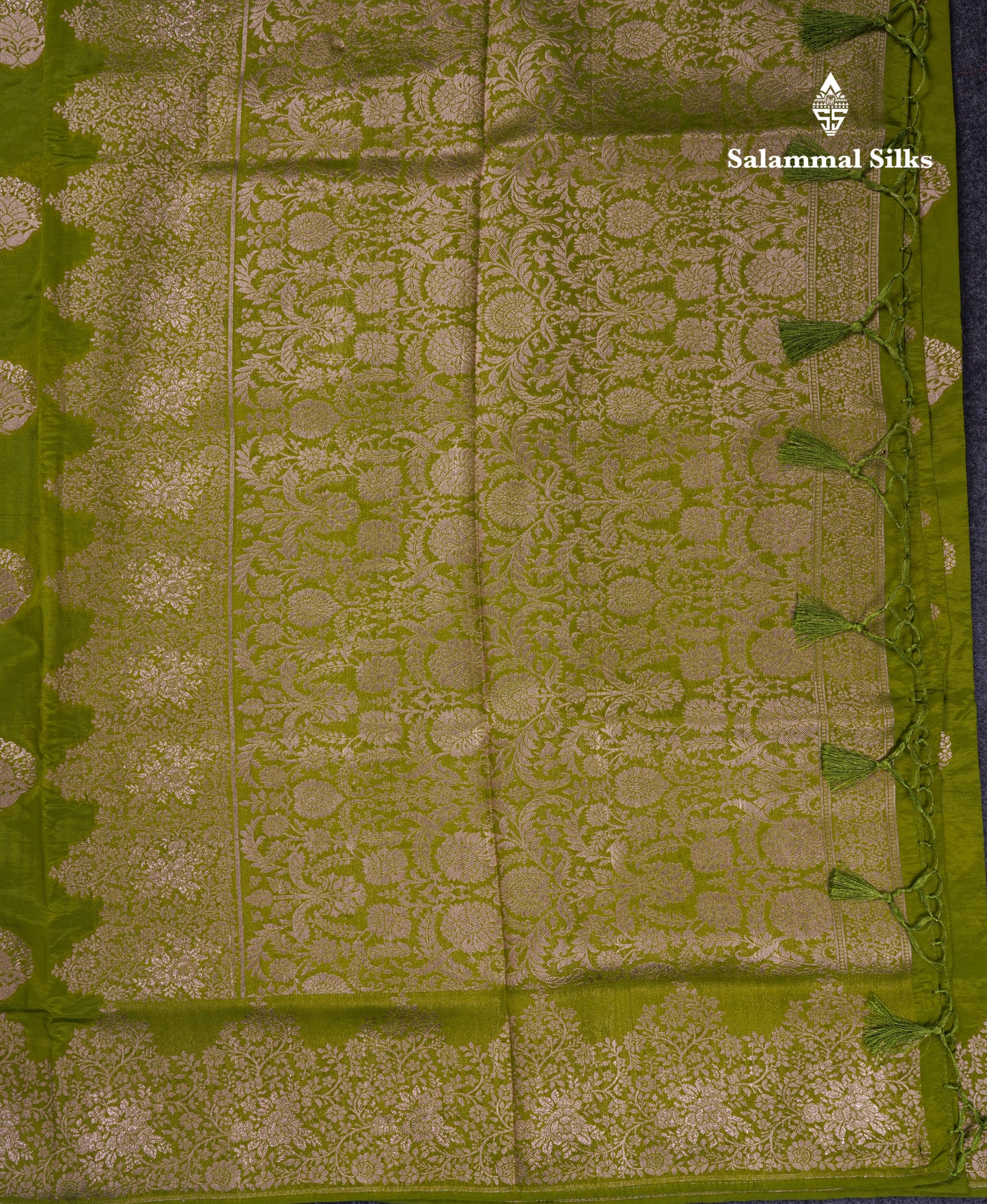 Beautiful Green Semi Raw Silk Saree With Fancy Border