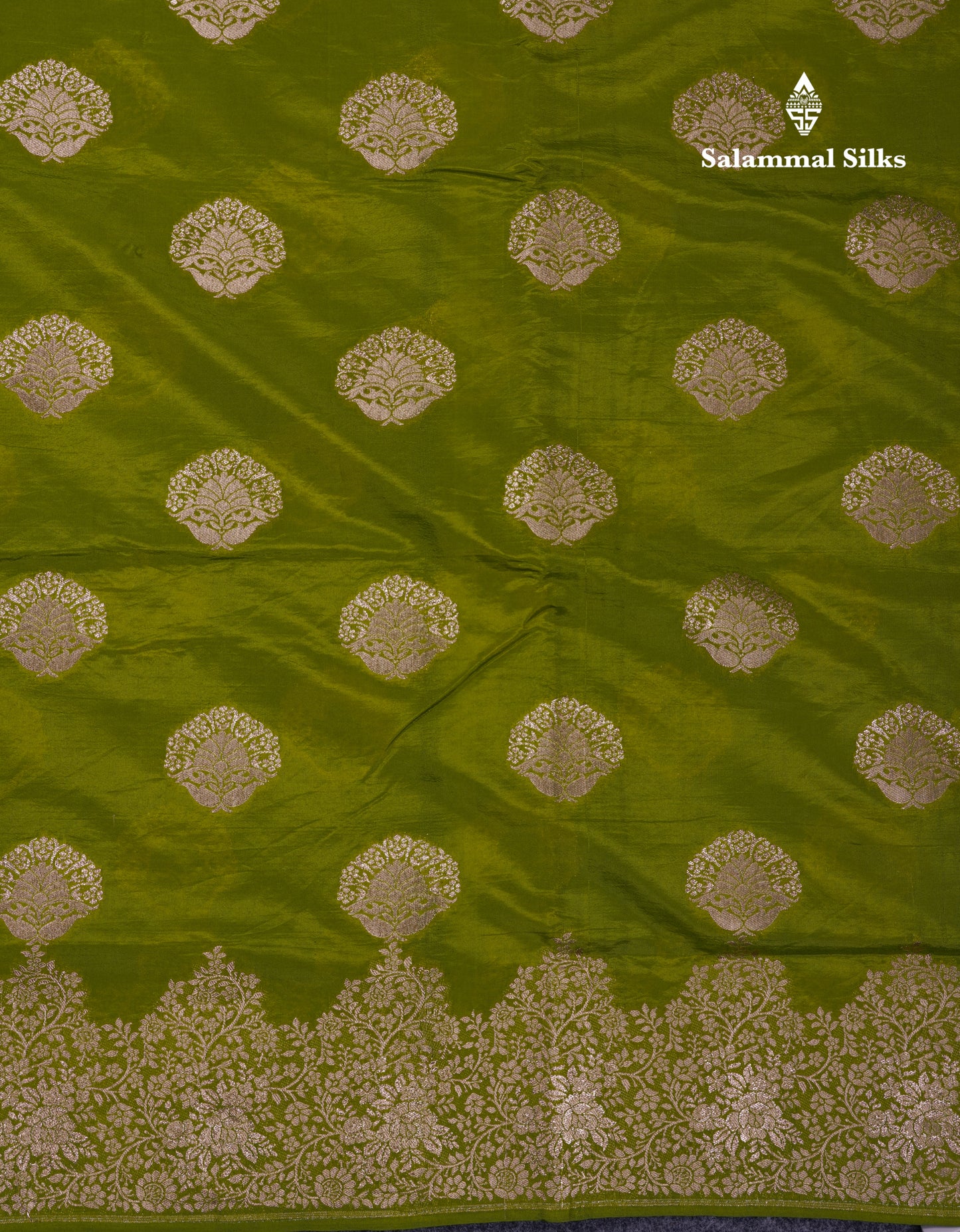 Beautiful Green Semi Raw Silk Saree With Fancy Border