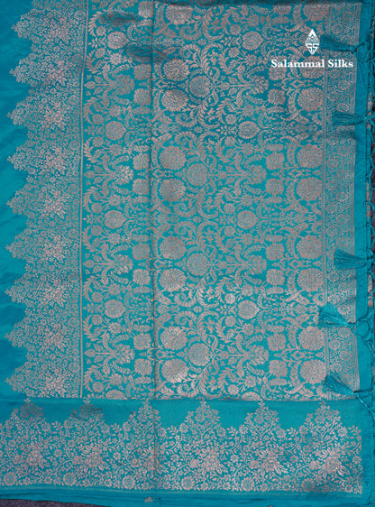 Beautiful Green Semi Raw Silk Saree With Fancy Border