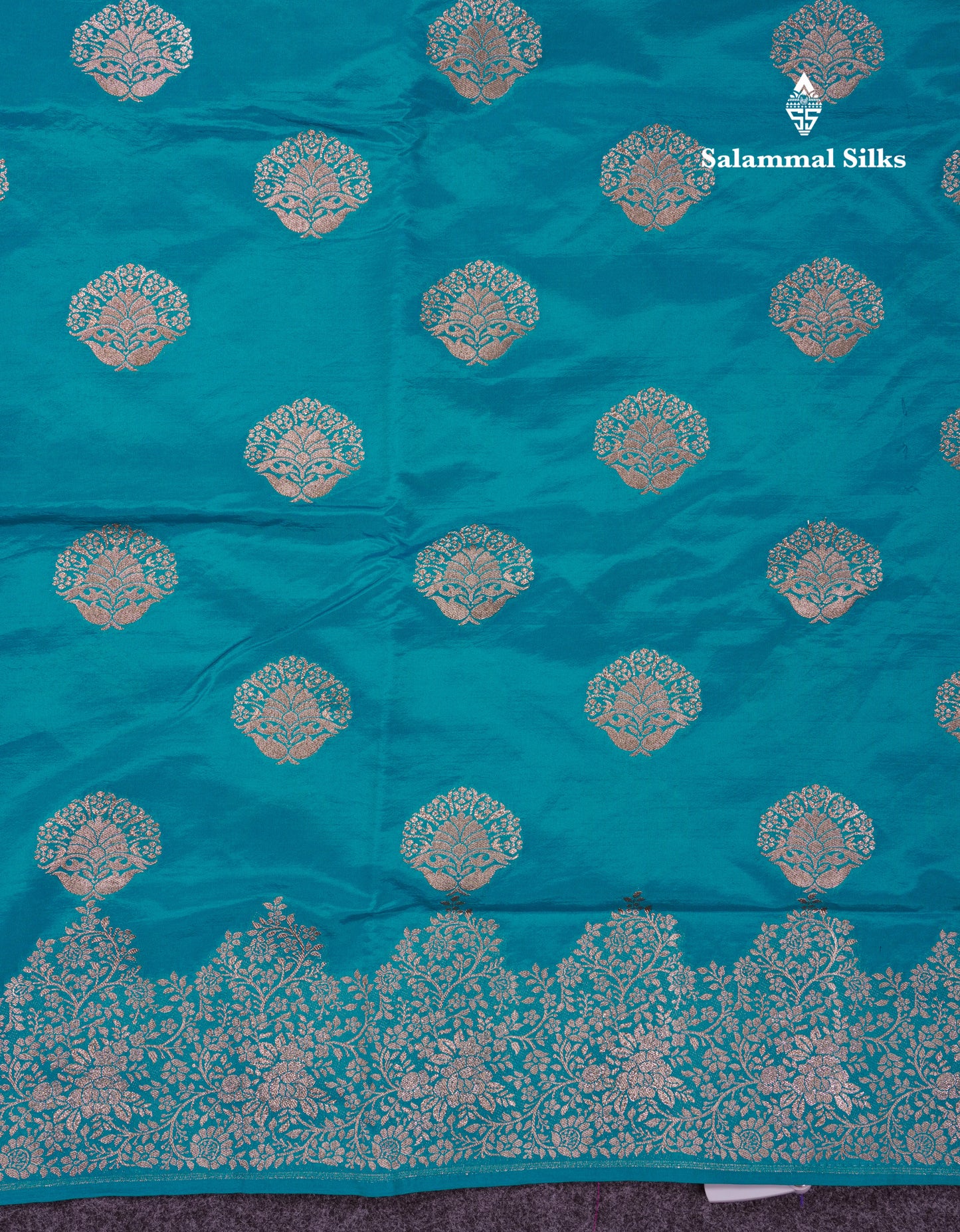 Beautiful Green Semi Raw Silk Saree With Fancy Border