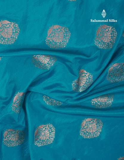 Beautiful Green Semi Raw Silk Saree With Fancy Border