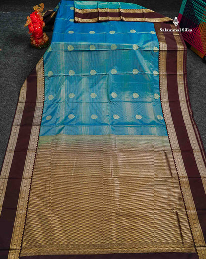 Peacock Blue Alai Vaira Oosi Lines With Butta Semi Silk Saree With Contrast Dark Brown Traditional Gap Border