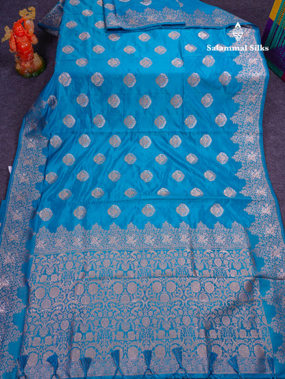 Beautiful Green Semi Raw Silk Saree With Fancy Border