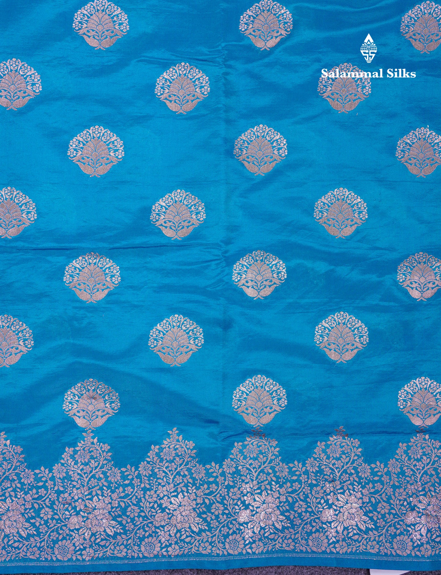 Beautiful Green Semi Raw Silk Saree With Fancy Border