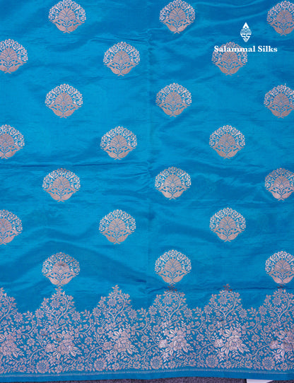 Beautiful Green Semi Raw Silk Saree With Fancy Border