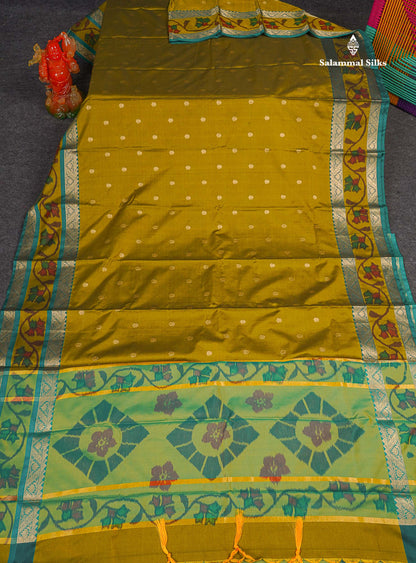 Semi Silk Saree - Olive Mustard Yellow Colour Body Zari Butta With Pochampally Fancy Border 