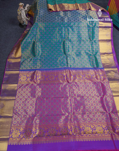 Dual Tone Peacock Green Bridal Pure Kanjivaram Silk Saree With Contrast Purple Border