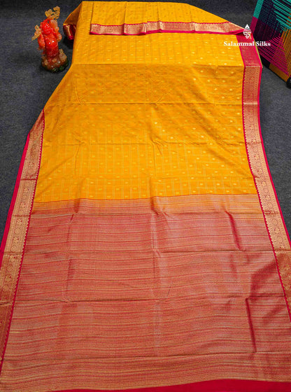 Semi Silk Saree - Mango Yellow Checks With Butta Along With Contrast Chilly Red Traditional Small Border
