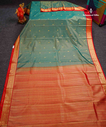 Semi Silk Saree -  Peacock Green Butta With Tiny Vaira Oosi Checks Along With Contrast Red Traditional Small Border