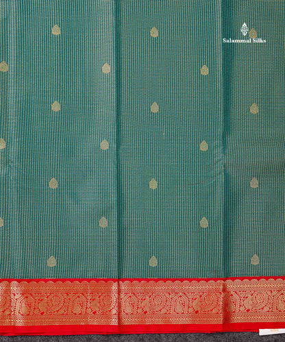 Semi Silk Saree -  Peacock Green Butta With Tiny Vaira Oosi Checks Along With Contrast Red Traditional Small Border