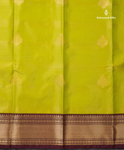 Semi Silk Saree - Parrot Green Alai Vaira Oosi Lines With Butta Along With Contrast Dark Brown Traditional Border